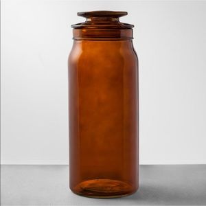 Hearth and Hand amber glass covered jar.